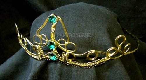 GOLD CIRCLET WITH GREEN STONES